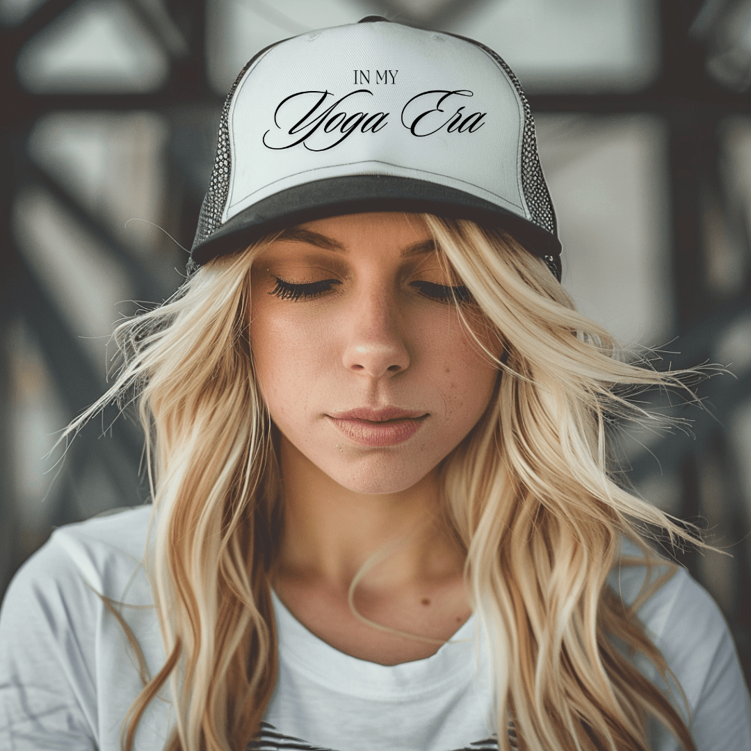 Girl wearing "In My Yoga Era" trucker hat